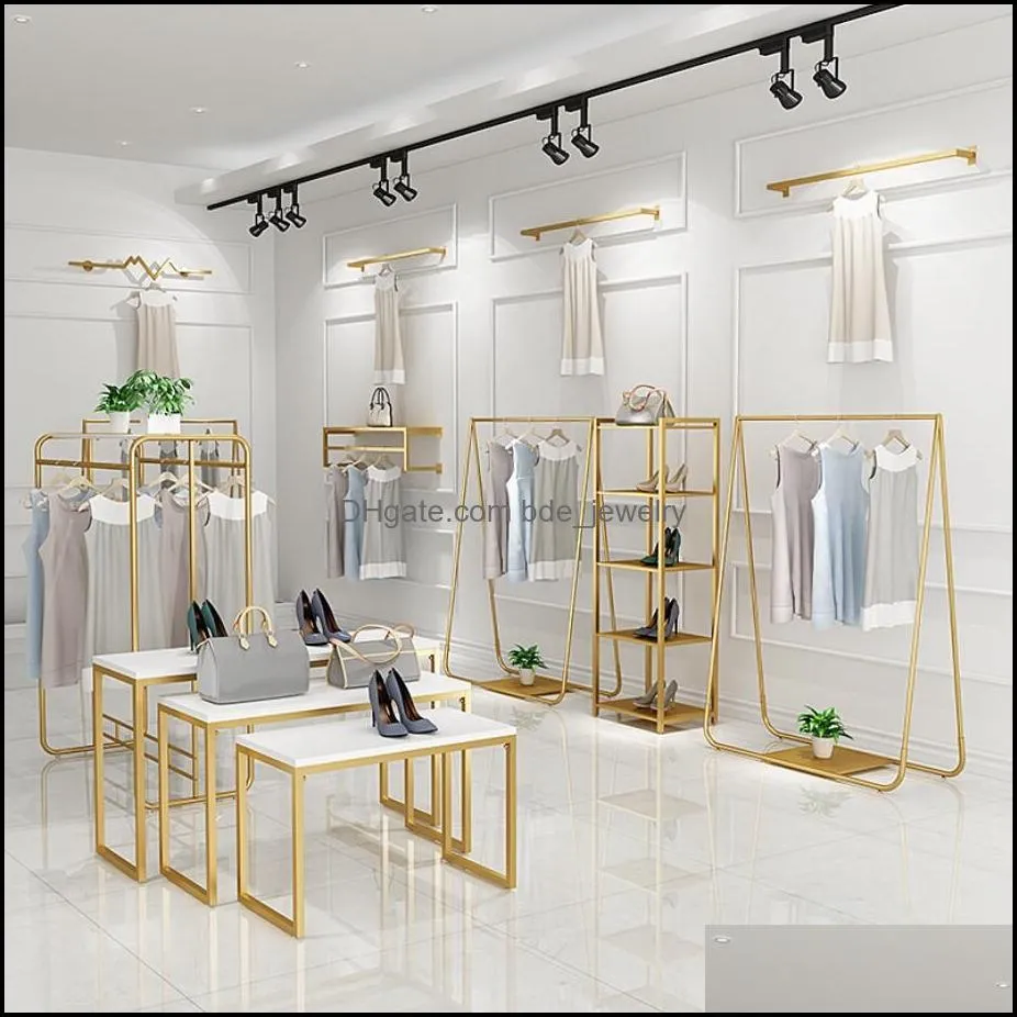 gold clothing store display rack bedroom furniture floor type womens cloth store hanger on the wall clothes racks and middle island show