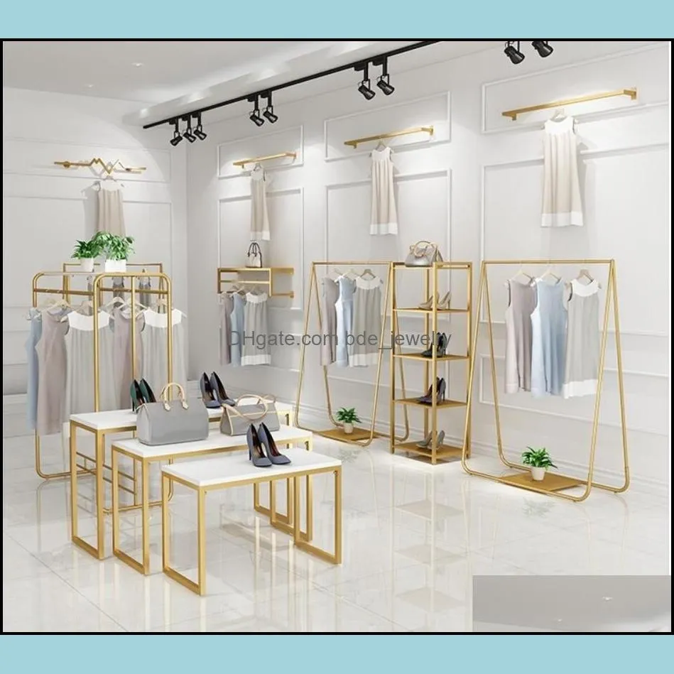 gold clothing store display rack bedroom furniture floor type womens cloth store hanger on the wall clothes racks and middle island show