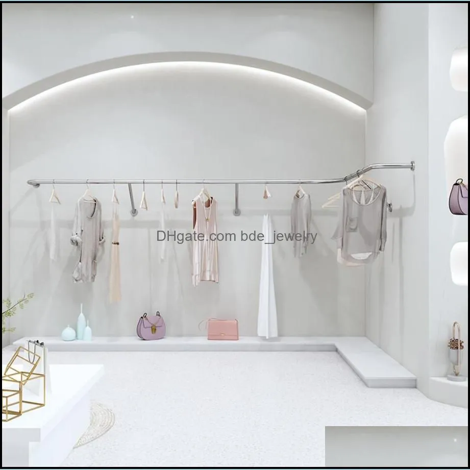 clothes pole hanging commercial furniture on the wall of womens clothing store stainless steel silver clothes hanger display racks