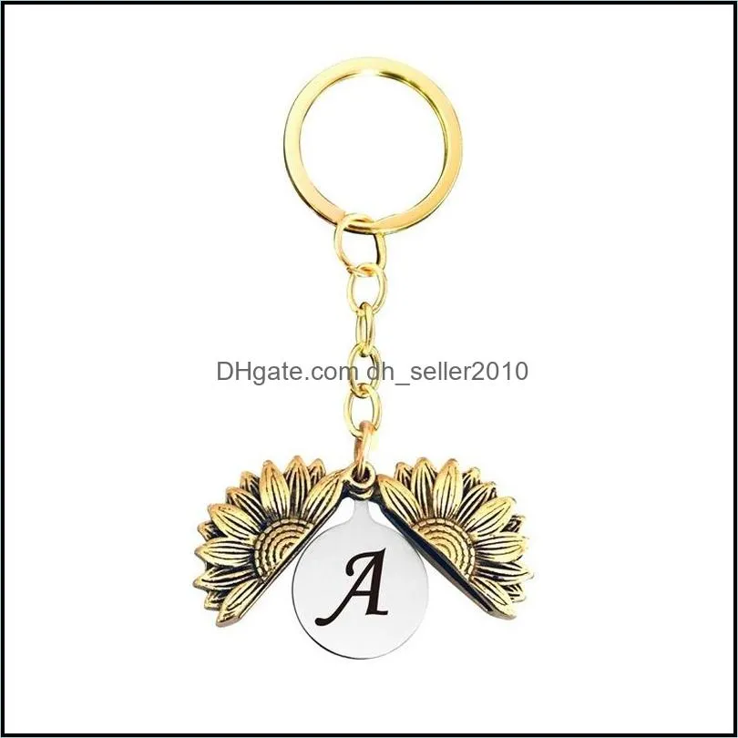 26 english letter sunflower locket key ring ancient gold initial keychain holders bag hang for women men fashion jewelry