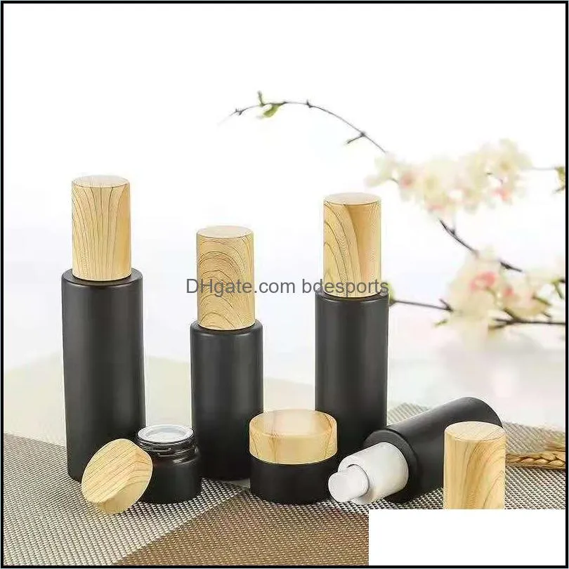 empty glass pump bottles refillable black frosted glass lotion essential oil spray bottle with woodgrain plastic cap 20ml 80ml 64 g2