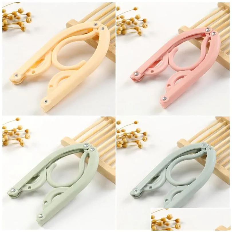 solid color fold coat hanger plastic clothes hangers portable clothing rack travel household goods quality fine 0 43yr d2