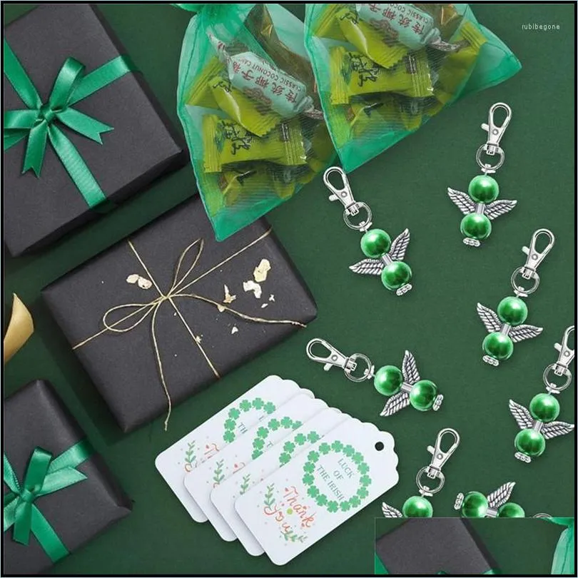 gift wrap st. patrick`s day guardian angel wings keychain party pendant key chain hooks with green candy bag irish holiday