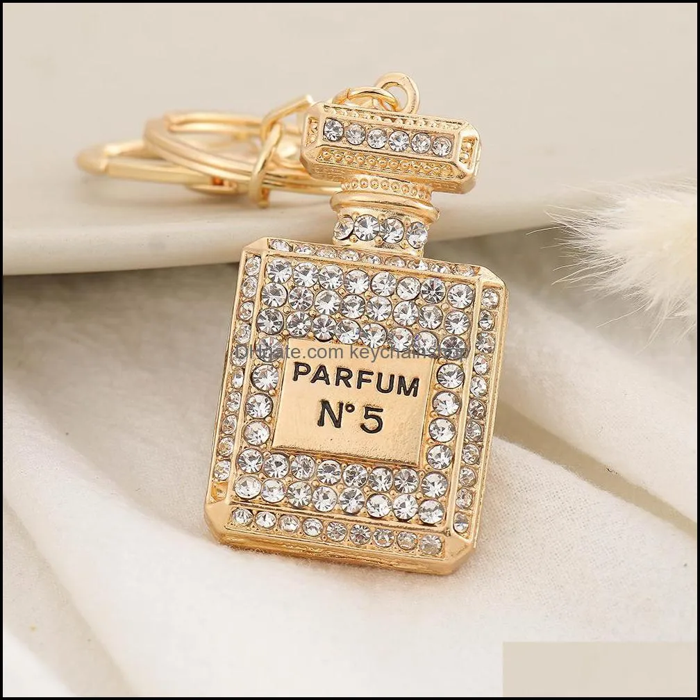 Crystal Perfume Bottle Keychains For Women Creative Diamond Bow Metal Key Chain Car Bag Pendant Small Gift Jewelry Accessories