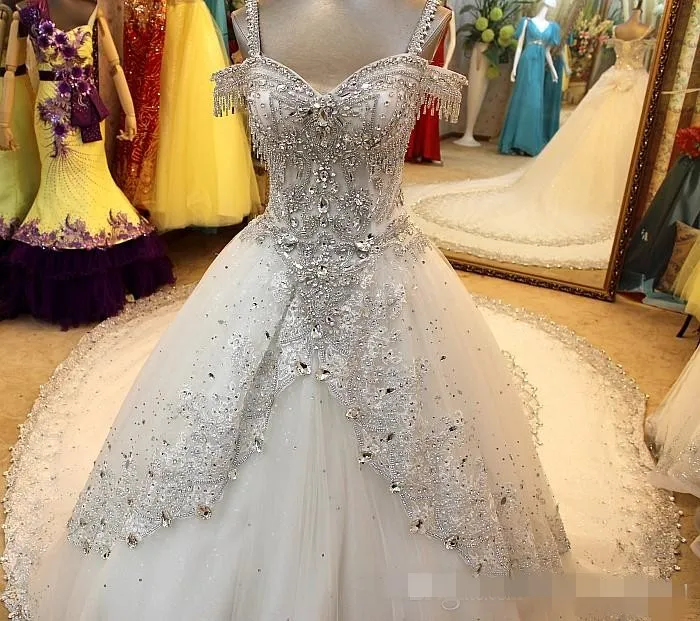 Newest Ball Gown Sparkling Wedding Dresses Luxurious Crystal Beaded Custom Made Bridal Gown Spaghetti Sexy Chapel Train Lace Applaiques