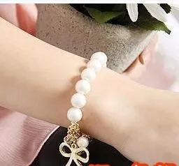 Vente chaude New Fashions belle perle bow nouveau bracelet bracelet perle bracelet bracelet livraison gratuite avec numéro de suivi
