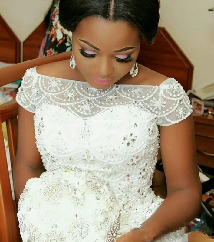 2018 Hot African Nigeria Mermaid Wedding Dresses Off Shoulder Crystal Beaded Tiered Ruffles Court Train Custom Plus Size Formal Bridal Gowns