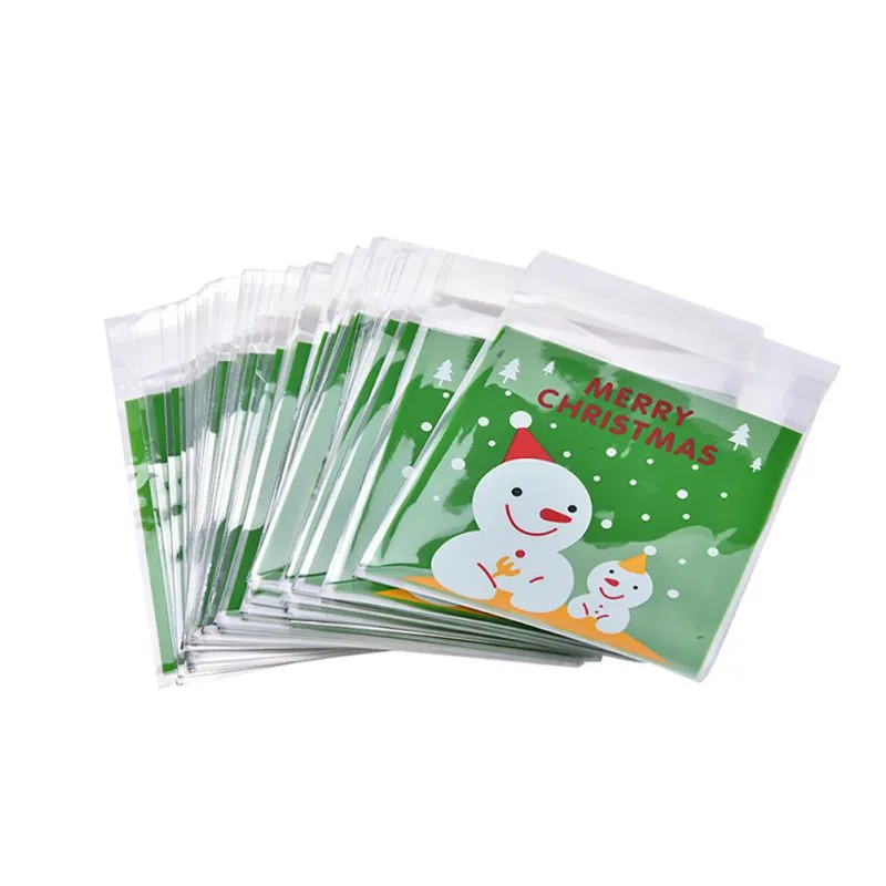 Decoraciones navideñas 100 unids / set Navidad Autoadhesivo Embalaje de galletas Bolsas de plástico Paquete de pastel de caramelo Bolsa de galletas Regalos Bolsas 1243v