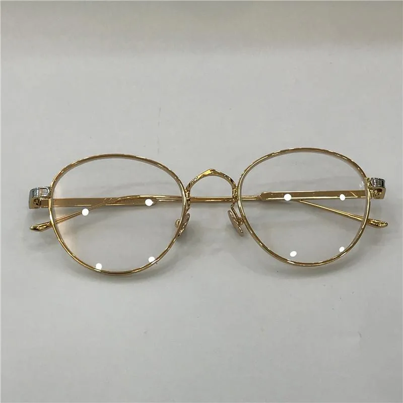 Novo designer de moda óculos ópticos 0009 metal redondo quadro retro estilo moderno lente transparente pode ser prescrição lentes claras265O