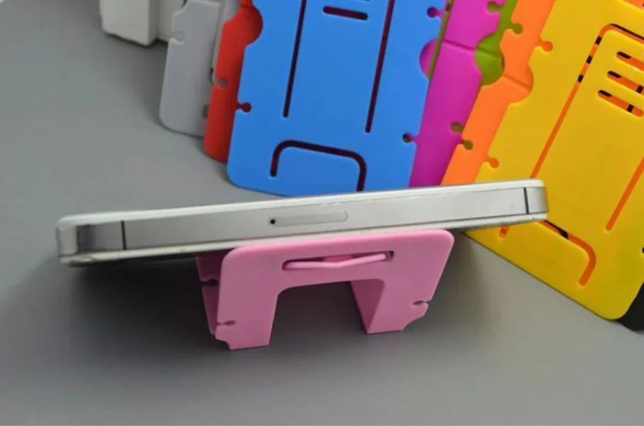حامل عالمي بلاستيكي متعدد الألوان لمكتب حامل الهاتف المحمول لبطاقة Samsung HTC Xiaomi قابلة للطي حامل كسول