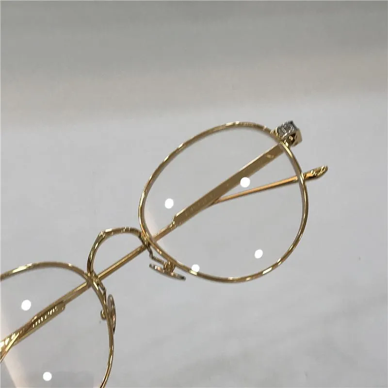 Новые модельерные оптические очки 0009 Металлическая круглая рама ретро -ретро -прозрачный стиль прозрачный