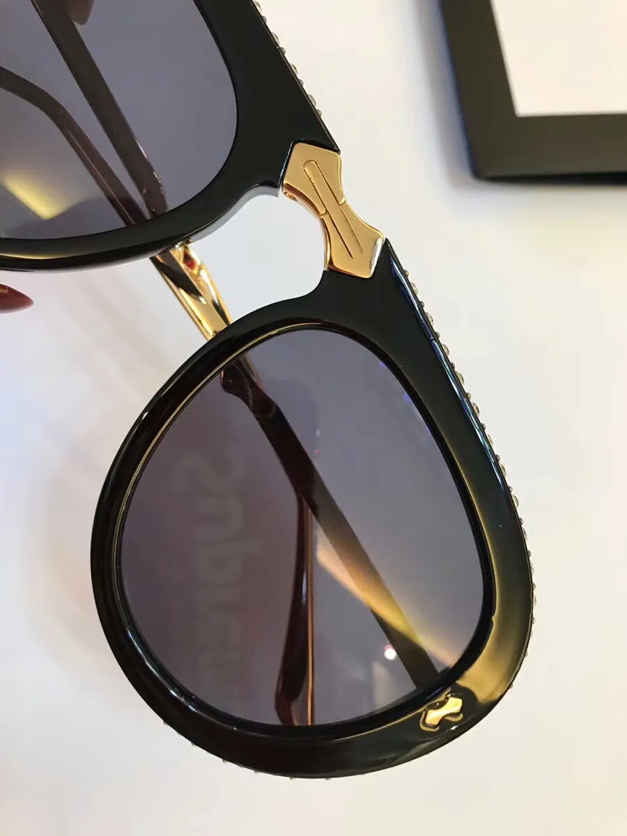 Kryształowe składane okulary przeciwsłoneczne dla kobiet mężczyzn luksus 0307 Złote czarne jasnoniebieskie okulary przeciwsłoneczne odcienie z pudełkiem286y