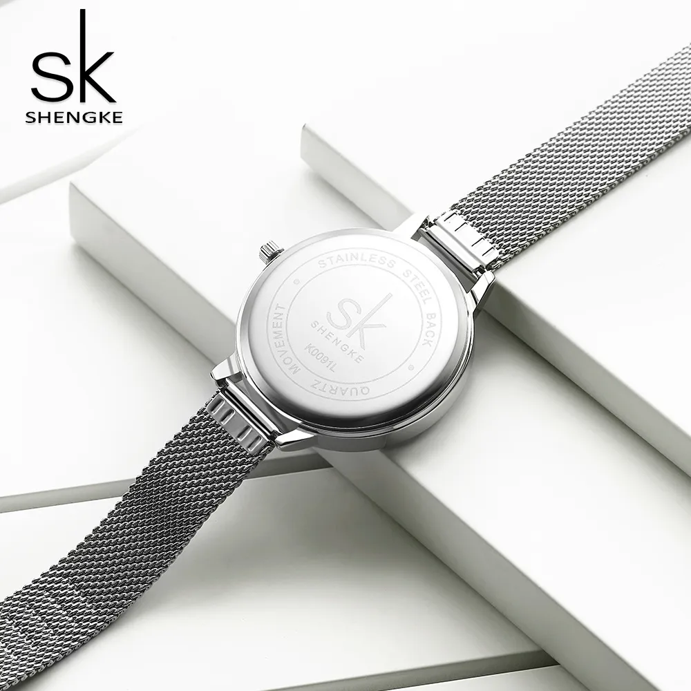 Shengke Reloj de Moda para Mujer Relojes Creativos Informales para Mujer Banda de Malla de Acero Inoxidable Reloj de Cuarzo Plateado con diseño Elegante para Mujer C218n