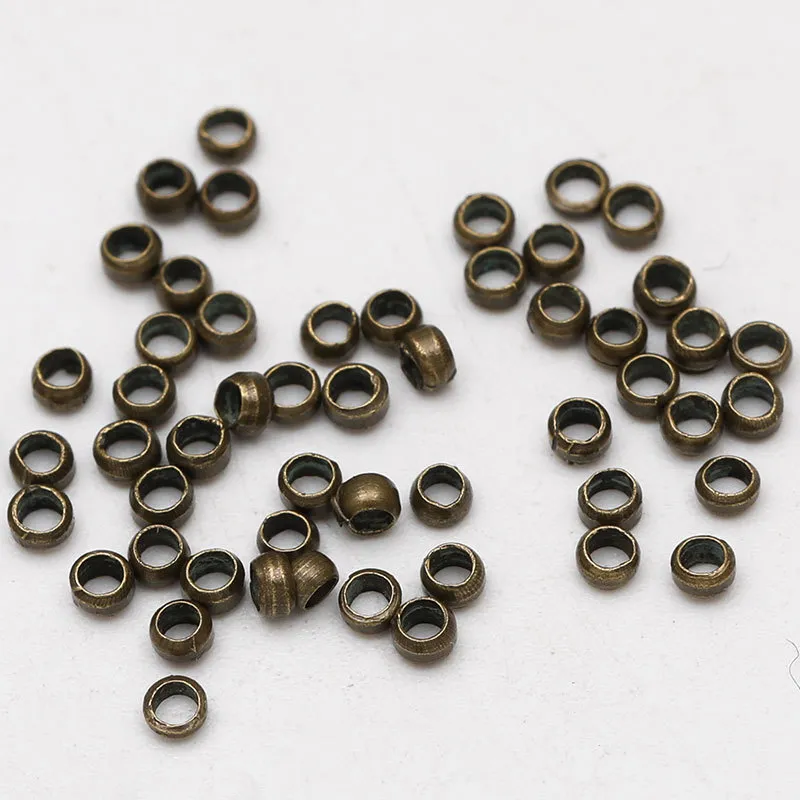 500 stks DIA 2 mm4 mm Copper Crimp Ball End kralen metaalgouden Goudzilver Big Hole Stopper Spacer Beads voor sieraden Making Bevindingen6630635