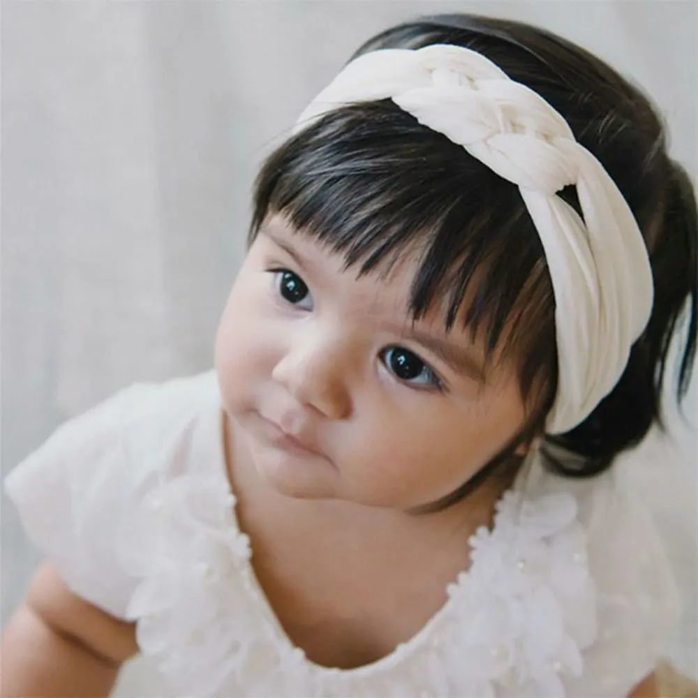 Solid söt baby elastisk pannband nyfödda mjuka flickor pannband kors knut turban hår tillbehör bomull headwrap hårband