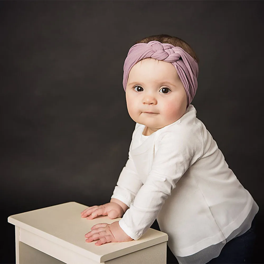 Solid söt baby elastisk pannband nyfödda mjuka flickor pannband kors knut turban hår tillbehör bomull headwrap hårband