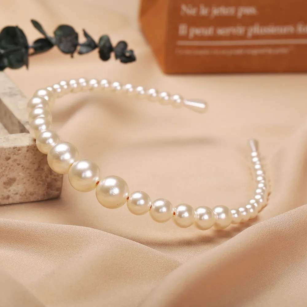 Ladies Creative Pearl Headband Temperament Headdress Brudhårtillbehör Kvinnor Retro Enkel pannbandsmycken smycken