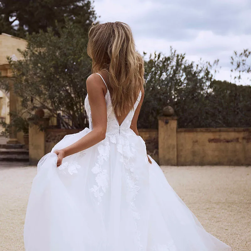 Robes de mariée bohème de quatre-arbres plage 2020 Appliques dentelle Spaghetti sangle robes de mariée blanches robes de mariée romantiques Vintage