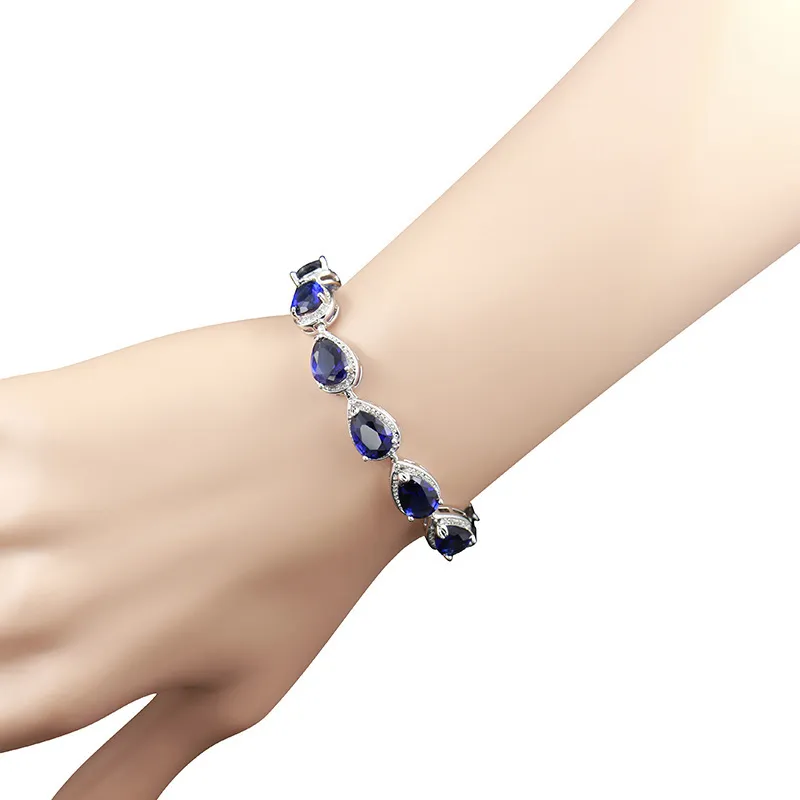 Bague Ringen Water Drop على شكل الياقوت الفضية 925 مجموعات المجوهرات للنساء الأحجار الكريمة الزرقاء الحلقة أقراط قلادة الزفاف M3094