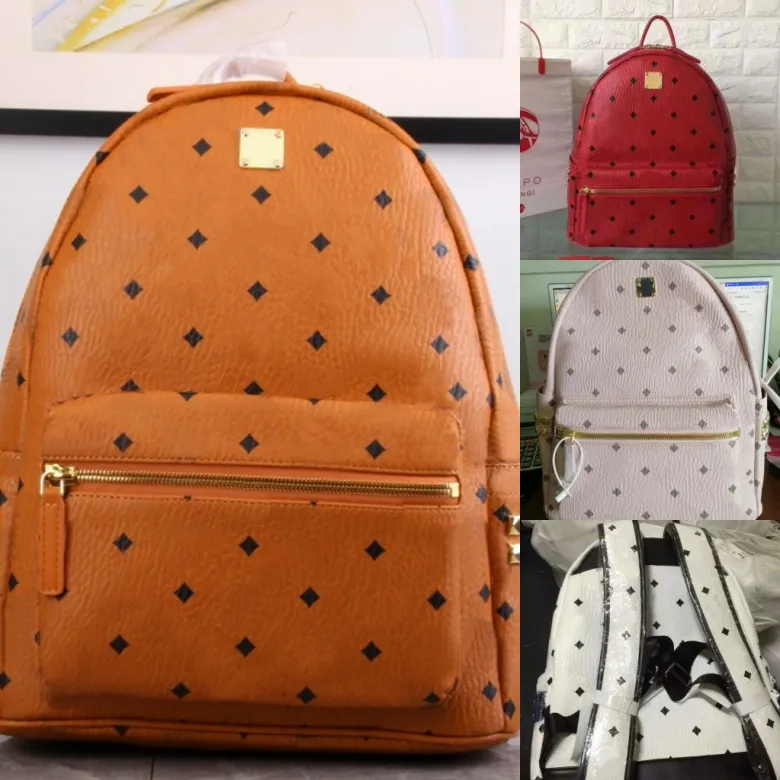 Top quality classic fashion Korean version punk rivet School Bags travel male and female student backpack220S