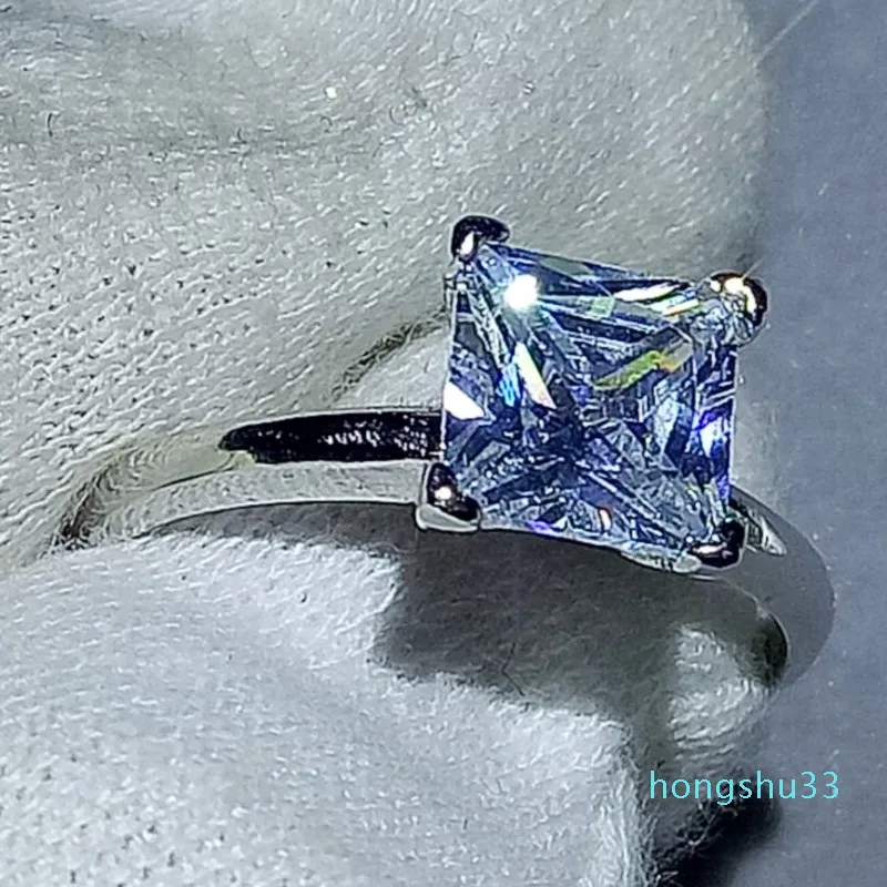 Solitario classico quattro artigli gioielli di lusso reale 100% argento sterling 925 taglio principessa topazio bianco donna anello nuziale fede regalo N217s