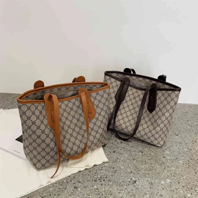 Handbag feminino outono de grande capacidade impressa em port￡til textura simples vers￡til f￡brica vendas online