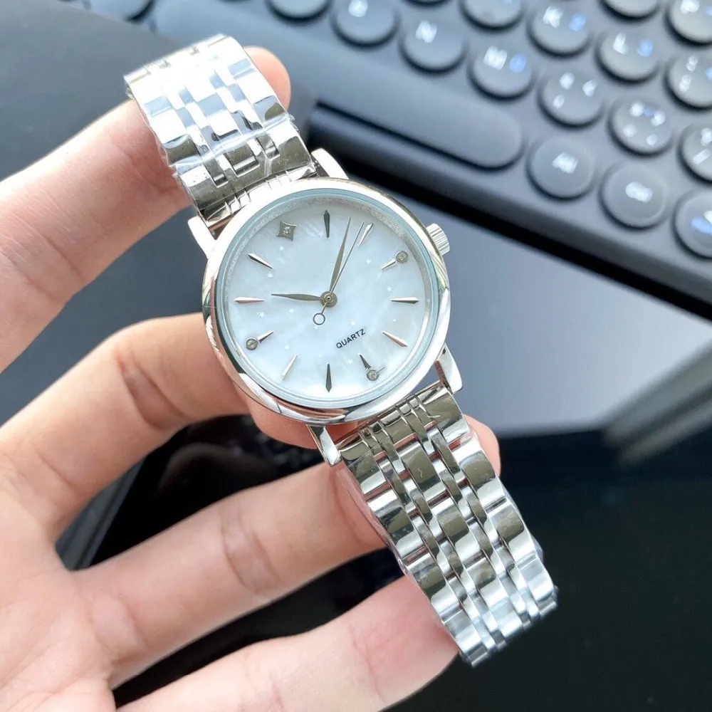 Top qualité en acier inoxydable strass montres bracelet en argent femmes cristal étoile montre à quartz nouvelle nacre coquille horloge 30mm