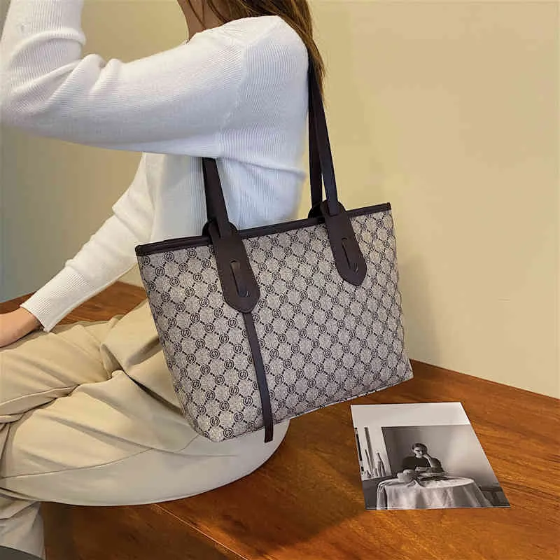 Handbag feminino outono de grande capacidade impressa em port￡til textura simples vers￡til f￡brica vendas online