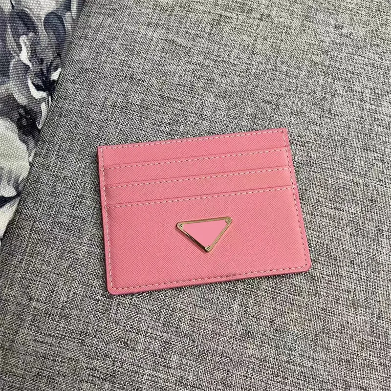 Novos detentores de cartas de moda Moman Woman Travel Mini Wallet Designer Pure Color Couro genu￭no Pebble Texture Luxury Black Cartet com Box32