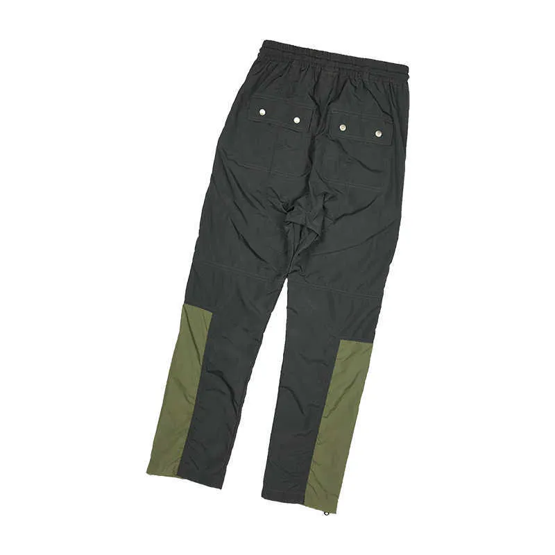 Pantalons pour hommes FAR. Arch hommes épissage fermeture éclair couleur bloquant loisirs sport fonction haute rue pantalon wookvibe, le même style