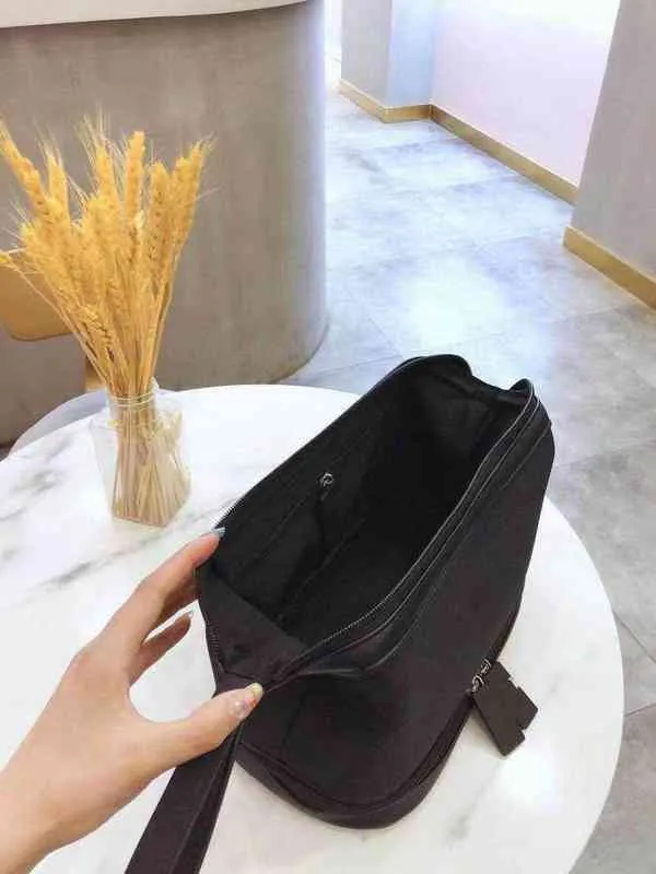 Nxy sacs à cosmétiques femmes étanche marque de luxe Multi fonction Portable magasin de voyage maquillage fermeture éclair s boîte 220303