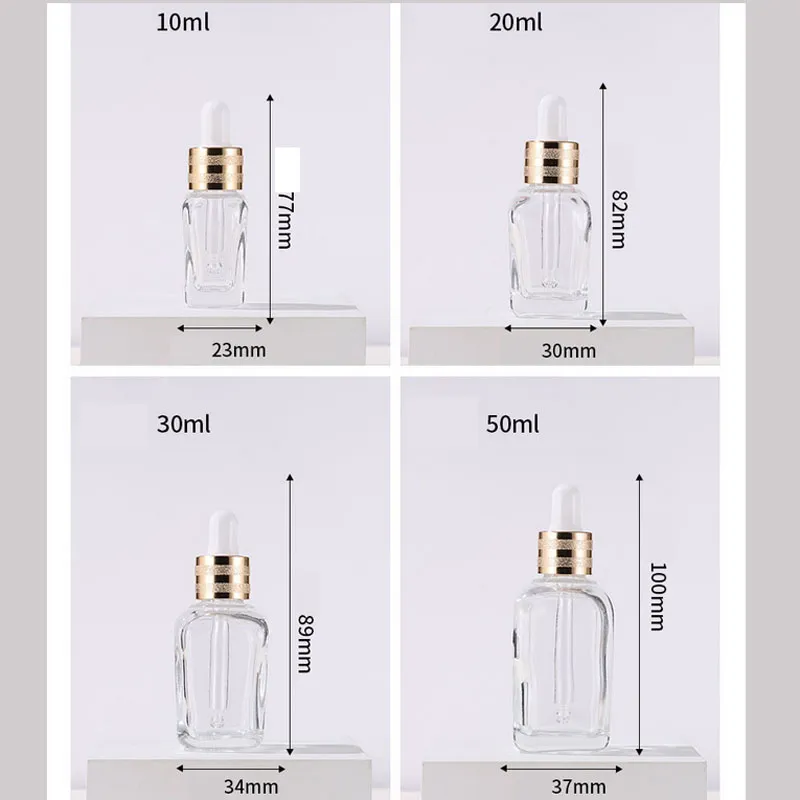 Transparente, klare 20 ml ätherische Öle, quadratische Tropfflasche, 10 ml, 30 ml, 50 ml Glas-Serumflaschen mit Goldverschluss für Kosmetika