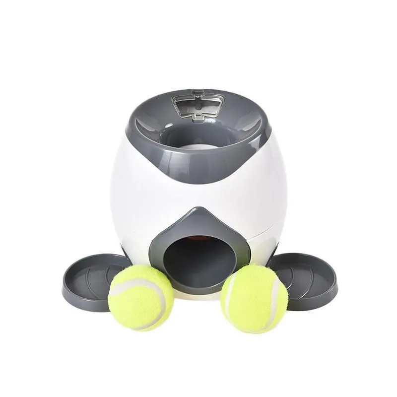 Pet Ball Launcher giocattolo cani Tennis cibo ricompensa macchina interattiva trattamento adatto e gatti mangiatoia cani lanciatore lento T N0M1 LJ201125