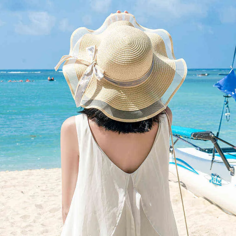 القبعات الصيفية للنساء القش الشمس قناع واسعة بريم طوي السيدات شاطئ قبعة الشمس حماية قبعات الإناث القوس كاب المرأة أزياء قبعة G220301