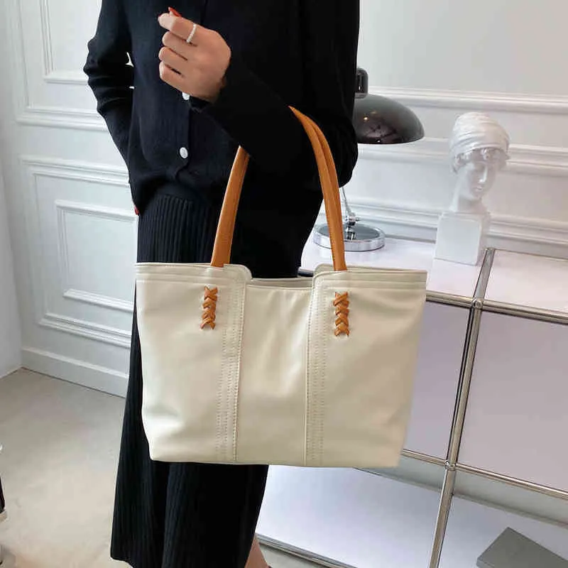 Shoppingväskor Casual Hand för Kvinnor Designer Tote Bag Sac Fourre Tout Femme Bolso Grande Travel Solid Soft Shoulder Classic NEW 220309