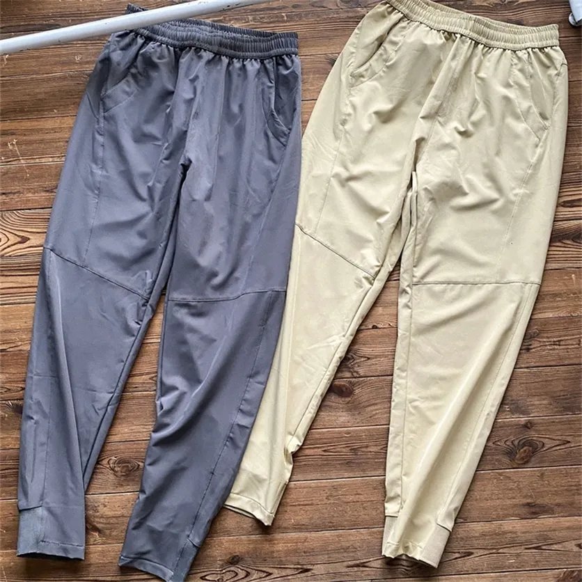 Warehouse clothing spring new men's and women's casual leg contraction pants elastic comfortable couple sports pants Sale online_FQFI