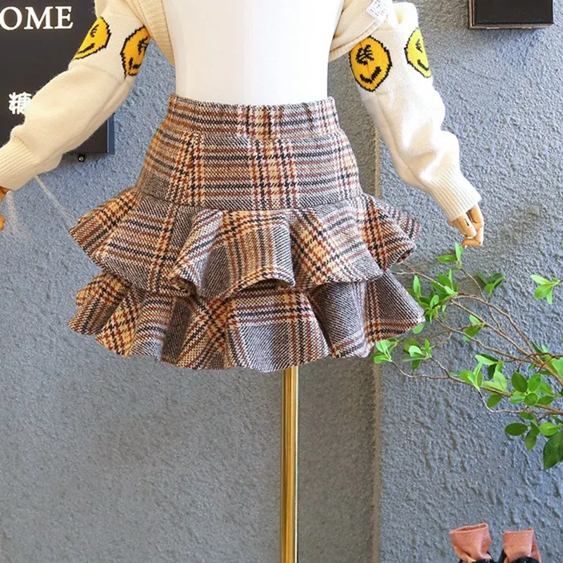 Kinderraok lente en herfst nieuwe dames college wind lotus blad rand wollen plaid rok kinderen shorts broek voor jongens