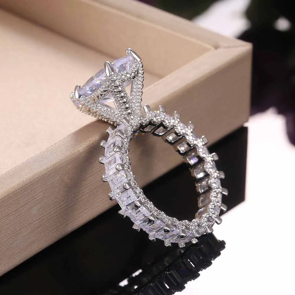 Anello con diamante simulato grande da 10CT Anello da cocktail unico con taglio a pera Anello di fidanzamento con pietre preziose con topazio bianco le donne280L