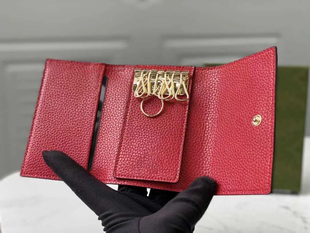 Donna corta portafoglio di portafoglio di portafoglio in pelle con hardware Six Keys Hooks Man Polpeys Porta dei carchi 456118246S