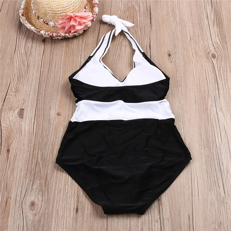 Ny 1 st badkläder Kvinnor Sexig halter Beach Wear Brasiliansk baddräkt svartvitt lapptäcke Push Up Bathing Suit Women Monokini T200708
