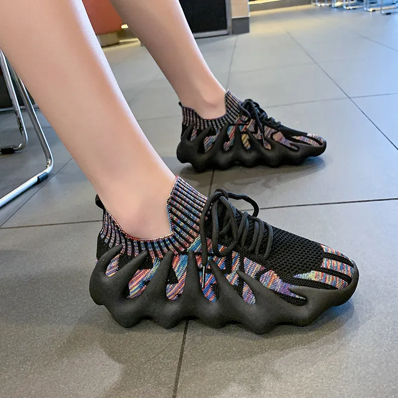 Älskare vulkaniska skor bläckfisk andningsbara flygande vävda mjuka solade kvinnors casual skor strumpor mun sneaker