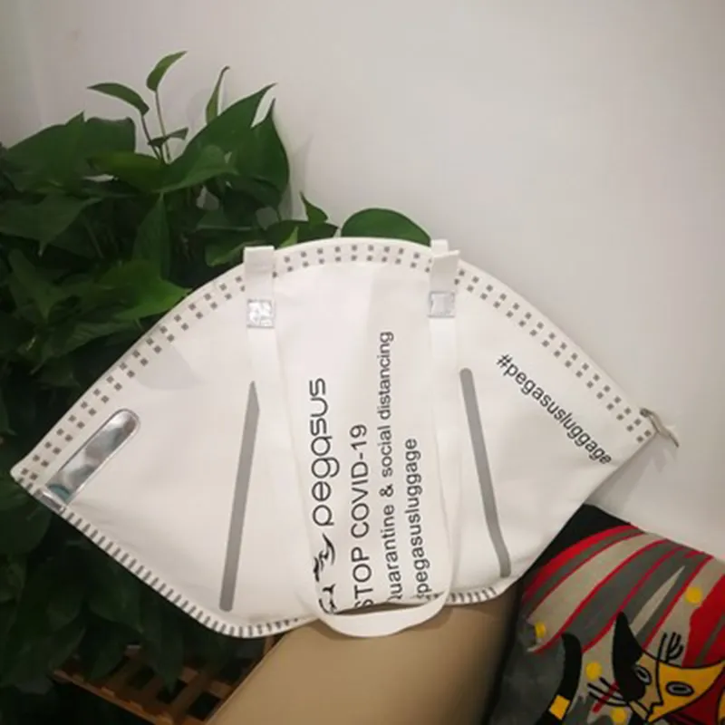 New Tide Уникальный дизайн Креативная сумка в форме маски Большая вместительная модная сумка для защиты окружающей среды Сумка для хранения одежды Ba281a