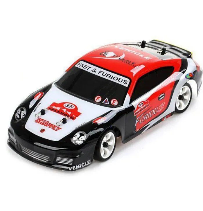 Wltoys K969 128 24G 4 roues motrices RC High Speed Racing Car 4 canaux Drift Brossed Remote Control Car Car Y2003173422457