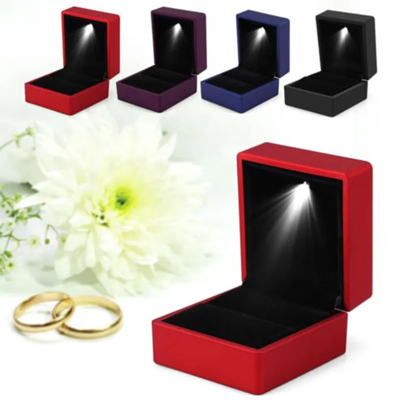 Kreatywne z lekką pudełko na biżuterię LED Pierścień Pierścień Pierścień Mały Wykwintny prezent Zaskoczenie Solid Kolor Prosta moda osobowość282v