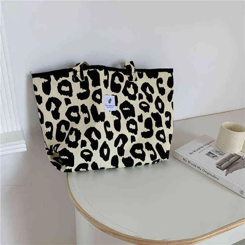 Shopping s fashionabla leopard stora canvas serie av leopard tote kosmetiska handväskor kvinnor axel bucket väska 220310