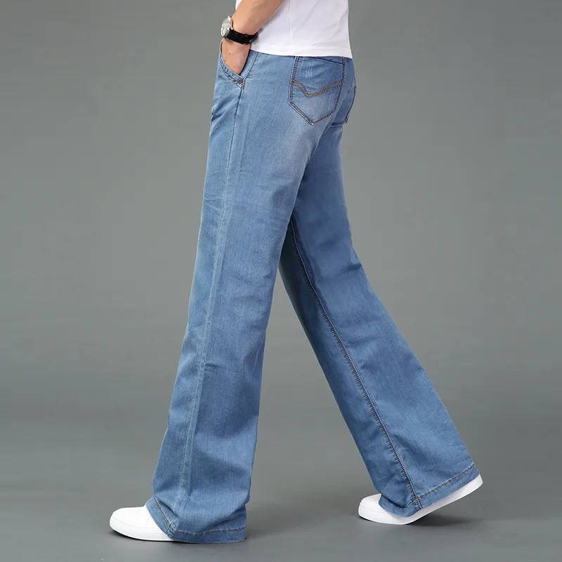 Dżinsy Mężczyźni Męskie Modis Duże Flared Jeans Boot Cut Leg Flared Luźne Fit High Paist Mężczyzna Designer Classic Blue Denim Jeans 20117