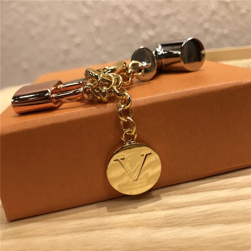 Клайтный роскошный дизайнер Gold Metal Key Buckle Classic Brand Letter Rose Lock Star Pendant Styly High -Caffice Buckains Bag Orna293O