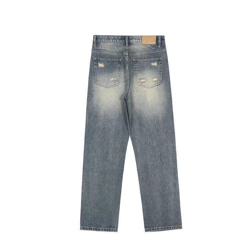 Jeans da uomo High street con lo stesso micro corno sciolto patch di giunzione casual barba di gatto jeans tagliati in modo irregolare