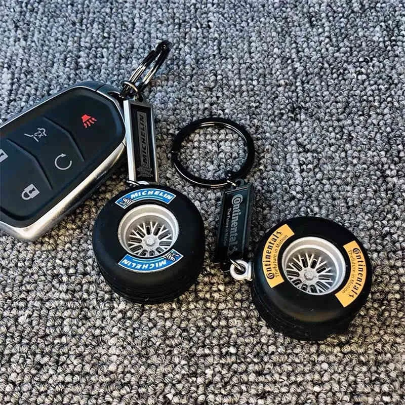 2022 Neuer abnehmbarer Hub -Reifen -Schlüsselbund Luxus Unisex Auto Schlüsselbund Ring Mini F1 Rennrad Reifen Keychain Gepäck Key CHARM273X9943704