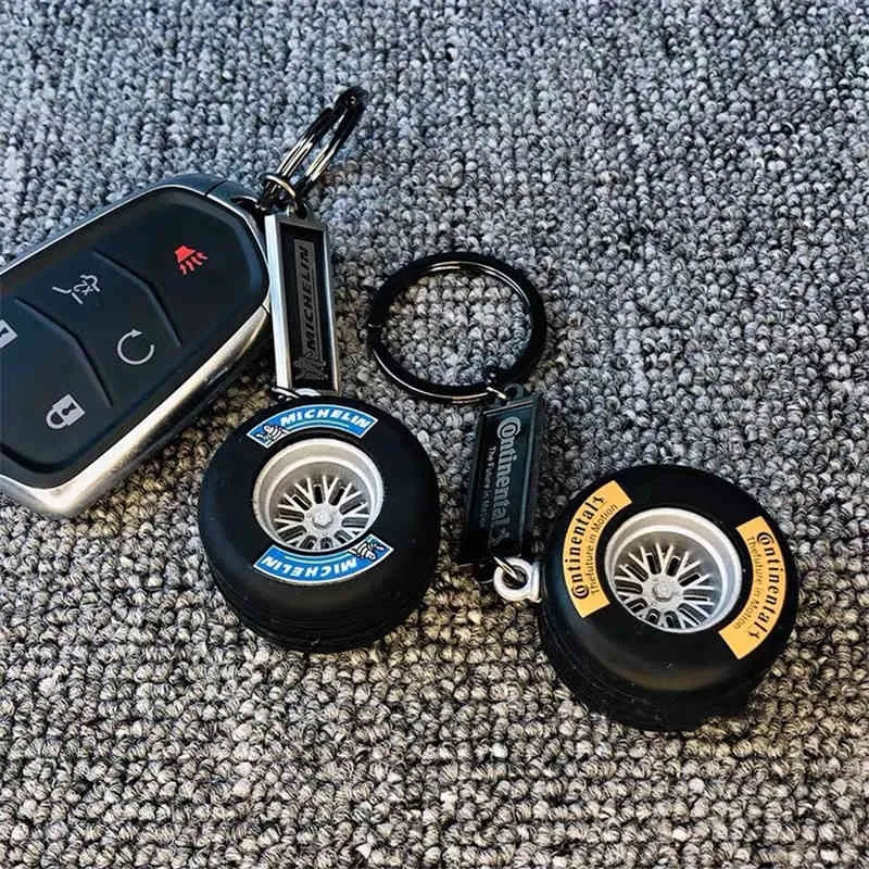 2022 Nouveau moyeu détachable pneu porte-clés de luxe unisexe voiture porte-clés anneau Mini F1 roue de course pneu porte-clés bagages clé Charm273x6681870